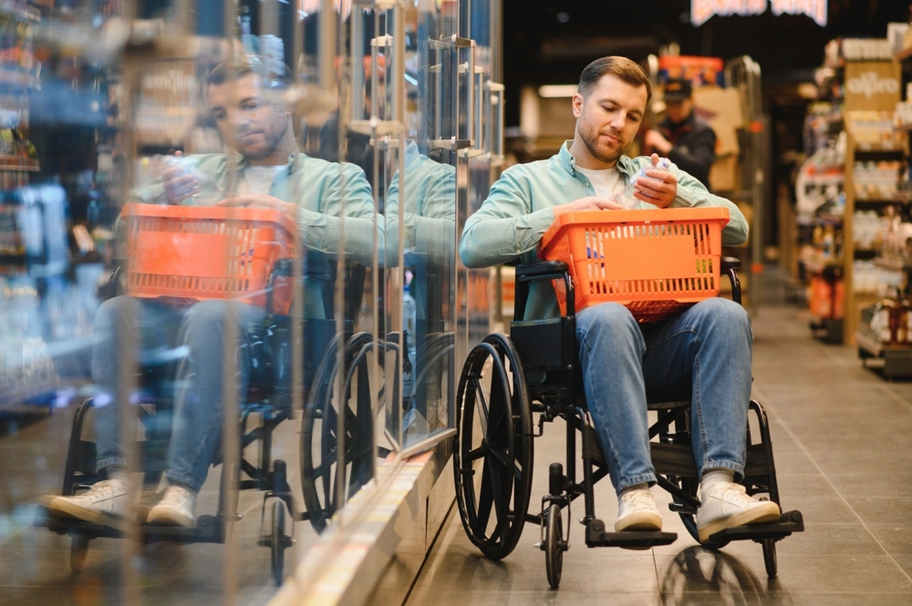 disabled men doing groceries on wheelchair